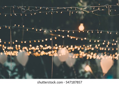 Light bulb decor in outdoor party