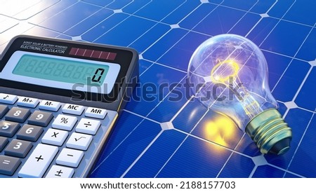 Light bulb and electronic calculator on solar panel. Renewable energy cost effective concept.