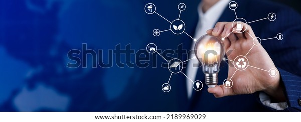 light bulb with energy worker interface,\
sustainable development with renewable energy icon,conservation of\
natural resources Environmental protection,electric car,\
powerplant, energy\
transmission