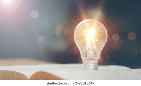 light bulb glowing on book, idea of ​​inspiration from reading, innovation idea concept, Self learning or education knowledge and business studying concept. - Powered by Shutterstock