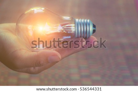 Light bulb in hand 