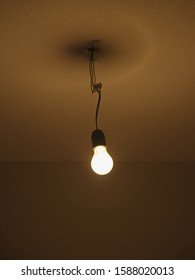 Light bulb hanging from ceiling