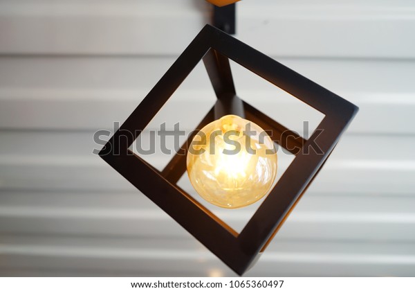 Light Bulb Hanging On Ceiling Lamp Stock Photo Edit Now 1065360497