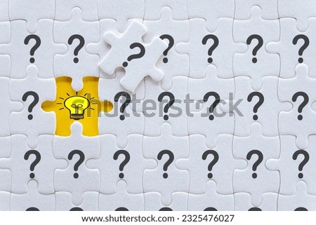 Light Bulb Icon on Missing Puzzle Piece over Question mark icon perfect for Creative Problem-Solving,Idea Generation and Innovation,Curiosity and Discovery,Creative idea and thinking,New ideas.