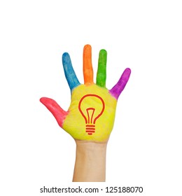 Light bulb (idea concept) on a colorful child's hand. Isolated on white background. - Shutterstock ID 125188070