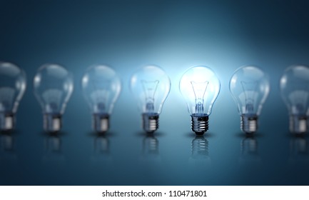 Light Bulb Lamps On A Colour Background