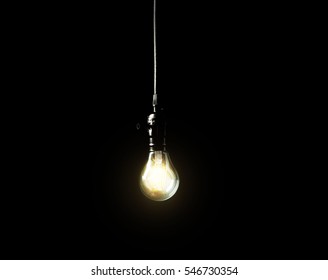 Light Bulb On Black Background