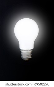 Light Bulb On Black Background