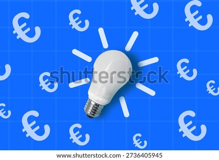 Light bulb on blue background with euro signs symbolizing financial ideas, investment, and innovation in business
