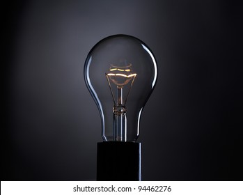 Light Bulb Over Dark Background