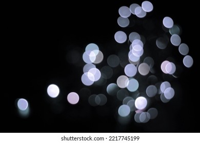 Light Bulb Overlay. Abstract Bokeh Light Background. Abstract Bokeh Background. Light Bulb Decoration. Christmas Or Wedding Lights Isolated On Black Background. String Wired Bulbs On Black Background.