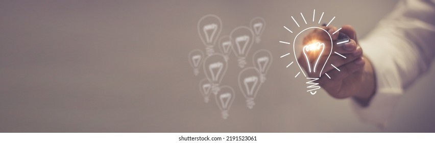 light bulb with shining halo cartoon style hand drawn style doodle style Symbolic concept of creativity, innovation, inspiration, invention and ideas.