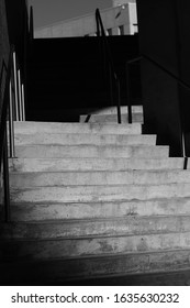 Light cascading down a stone staircase