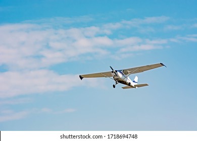 Light Cessna Plane Flies In The Sky