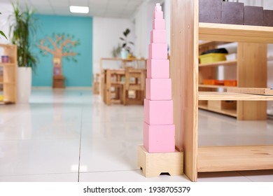 Light class in Montessori kindergarten. The pink tower is in the foreground. nobody.