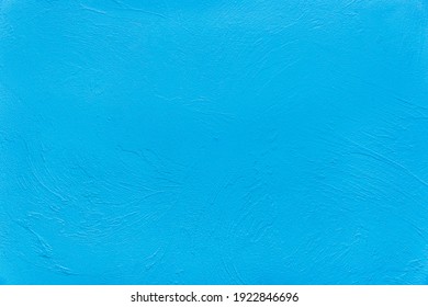 Light Clean Blue Plaster Wall Texture Stucco Background.