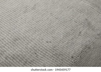 Light cloth with bobbles, closeup. Before use of fabric shaver - Shutterstock ID 1945459177