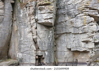 Light Coarse Natural Rock Stone Background. Mining Cliff Rough Front Surface. Big Limestone Stack Backdrop. Heavy Grunge Damaged Granite Block Texture. Crack Antique Medieval Stony Facade For Design