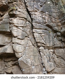 Light Coarse Natural Rock Stone Background. Mining Cliff Rough Front Surface. Big Limestone Stack Backdrop. Heavy Grunge Damaged Granite Block Texture. Crack Antique Medieval Stony Facade For Design