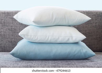 light color pillow on sofa.