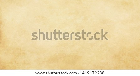 Light colored beige vintage paper. Old stained papyrus wallpaper for design work with copy space.