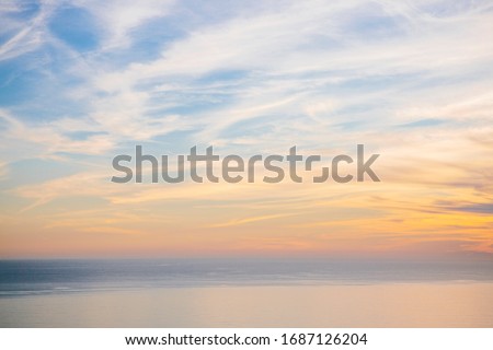 Light colored pastel sunset over the Pacific Ocean