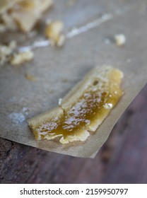 Light Coloured Cannabis Hash Rosin On Parchment Paper