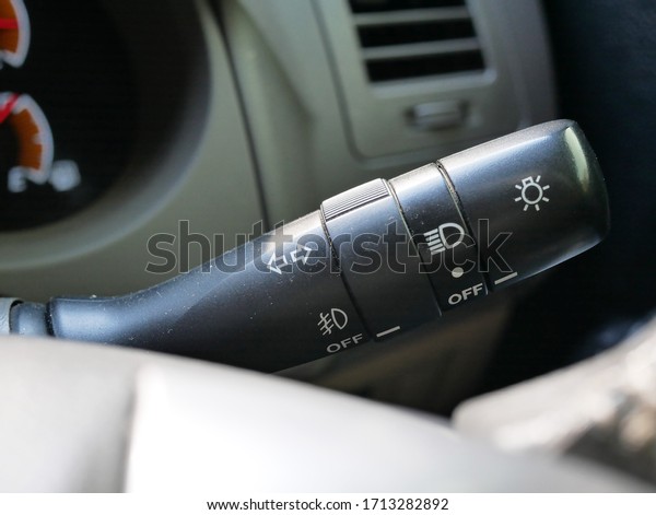 light control of headlights adjustment lever in\
a car,car interior.