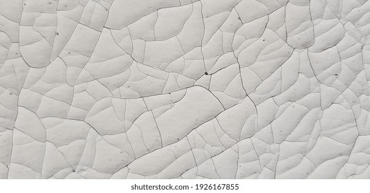 Light cracked plastic surface (top view, texture).