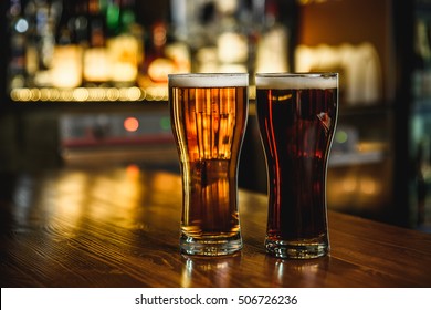 Light And Dark Beer On A Pub Background.