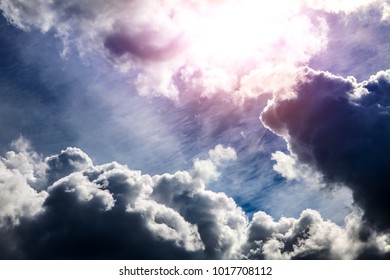 Light in the Dark and Dramatic Storm Clouds - Shutterstock ID 1017708112