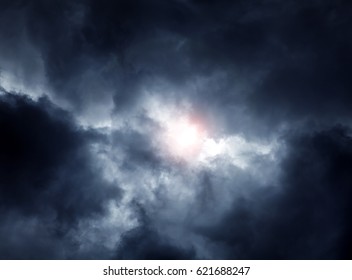 Light in the Dark and Dramatic Storm Clouds