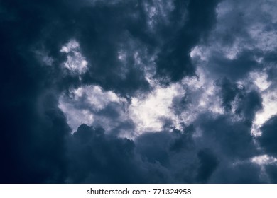 Light in the Dark and Dramatic Storm Clouds