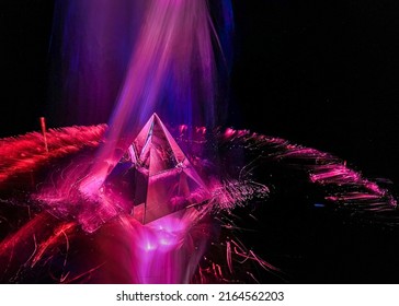 Light Drawing Of A Crystal Pyramid As A Background