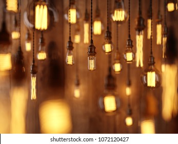 The light from the Edison lamp. Hang on the background of a wooden wall, depth-of-field camera effects. 3D rendering