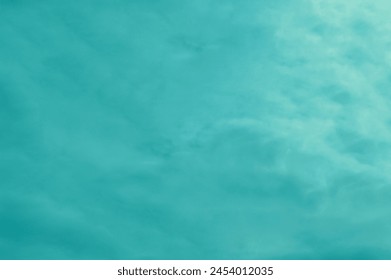 Light emerald green dramatic sky background empty blank space natural pattern surface wallpaper. Aquamarine green Pastel background marble texture. serene teal colorful background. sstkBackgrounds. Foto Stok