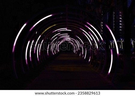 light at the end of arc tunnel in Shanghai night park