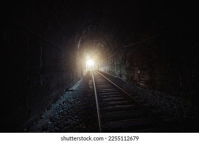 Light at the end of railroad tunnel.