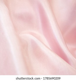 Light fabric texture,  waving bedding sheets background, silk fabric background
