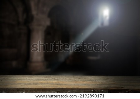 light falling through window in old church.