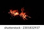 A light of fire flame in the darkness 