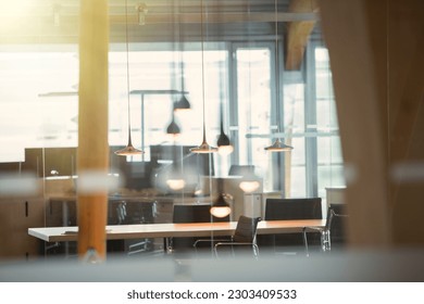 Light fixtures and desks in empty office