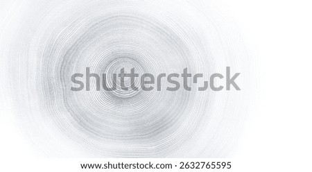 Light gray blue monotone impression of end grain of wood slab. Tree rings art with texture and smooth surface.
