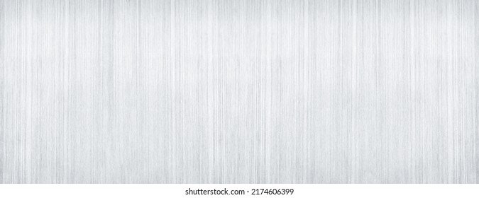 Light gray brushed metal texture. Silver metallic grey surface widescreen textured background