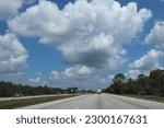 
Light gray clouds  roll over the South Carolina highway
