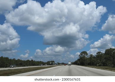 
Light gray clouds  roll over the South Carolina highway