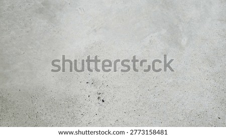 Light gray concrete texture desktop wallpaper with subtle speckles and a smooth, matte finish