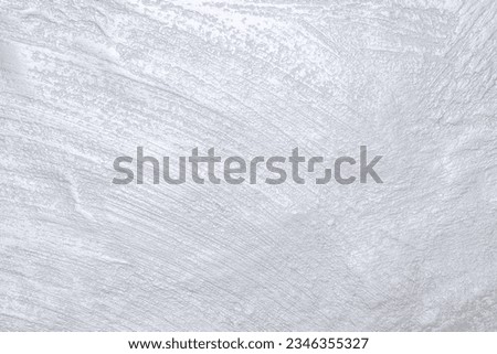 Light gray pearlescent plaster stone wall texture background