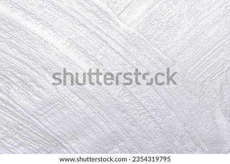 Light gray pearlescent plaster stone wall texture background