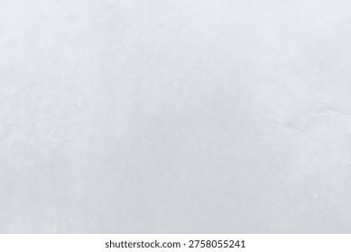 Light gray textured background with subtle cracks and a smooth, matte finish, ideal for minimalist designs or as a neutral backdrop.